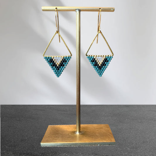 Spruce green, matte black, gold coloured, white and smokey facetted crystal beaded earrings.