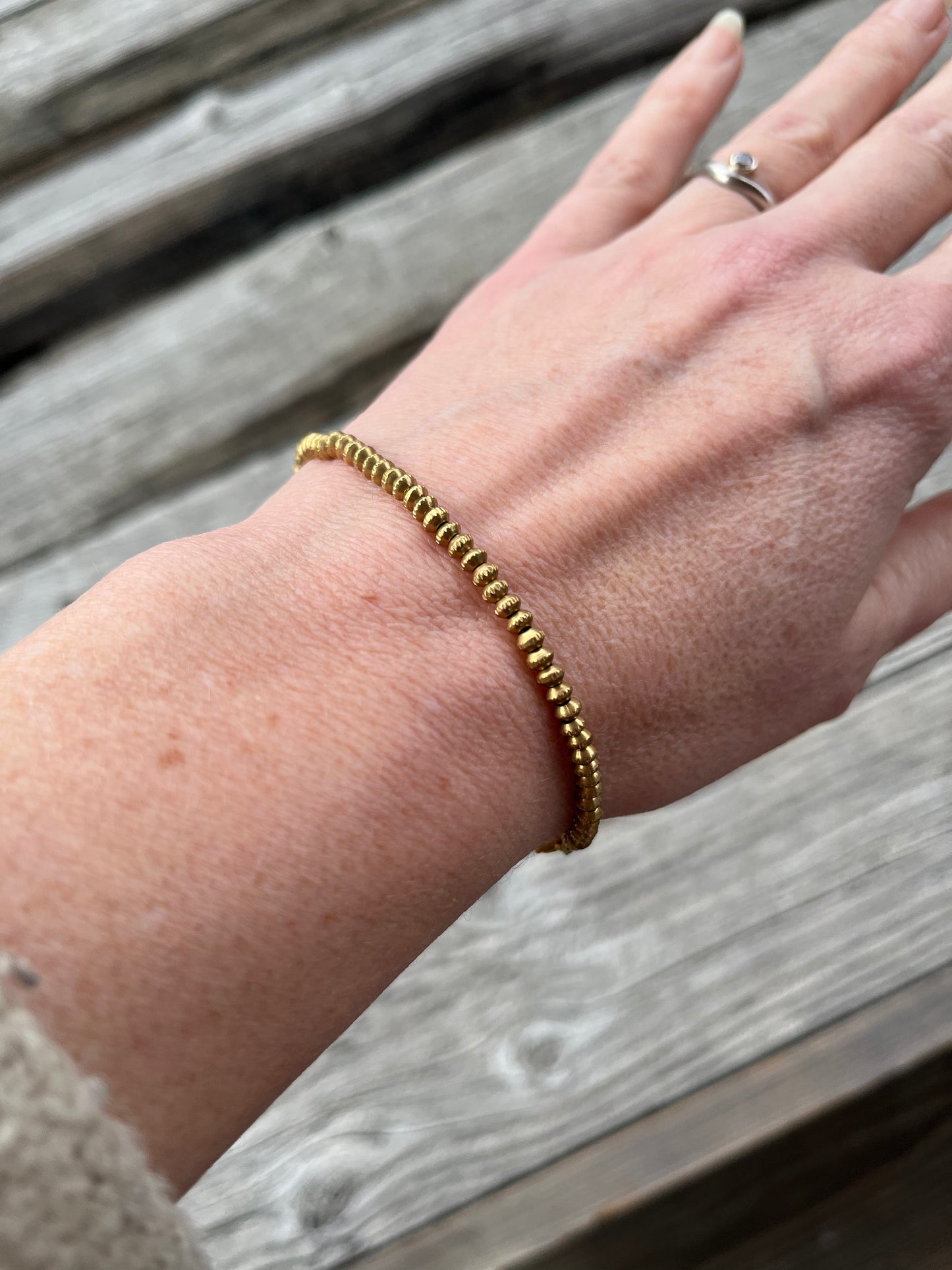 Antiqued Brass Patterned Heishe Beaded Bracelet